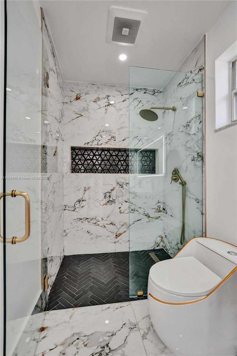 3460 North 46th Avenue Hollywood, FL 33021 - Photo 24 of 35 a bathroom with a sink toilet and shower