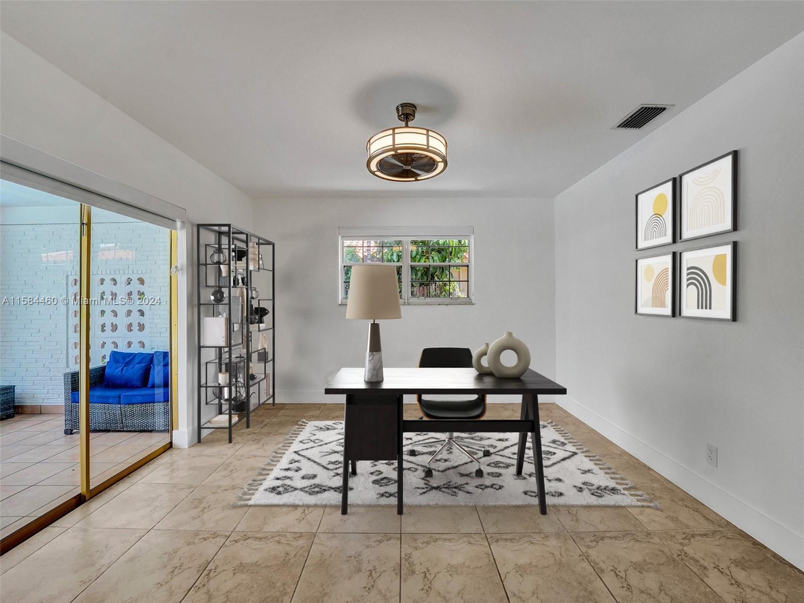 3460 North 46th Avenue Hollywood, FL 33021 - Photo 30 of 35 a view of a livingroom with furniture and window