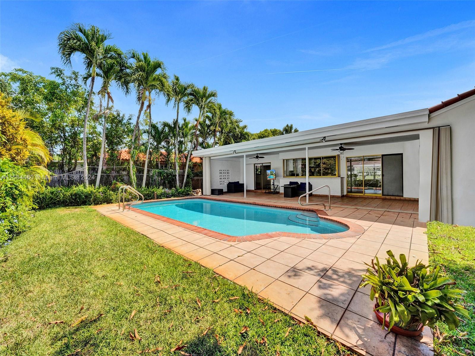 3460 North 46th Avenue Hollywood, FL 33021 - Photo 35 of 35 a view of house with swimming pool outdoor seating