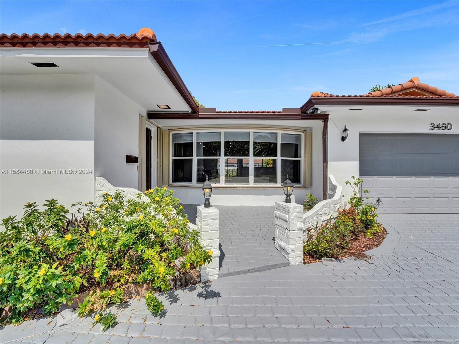 3460 North 46th Avenue Hollywood, FL 33021 - Photo 6 of 35 front view of a house with a yard