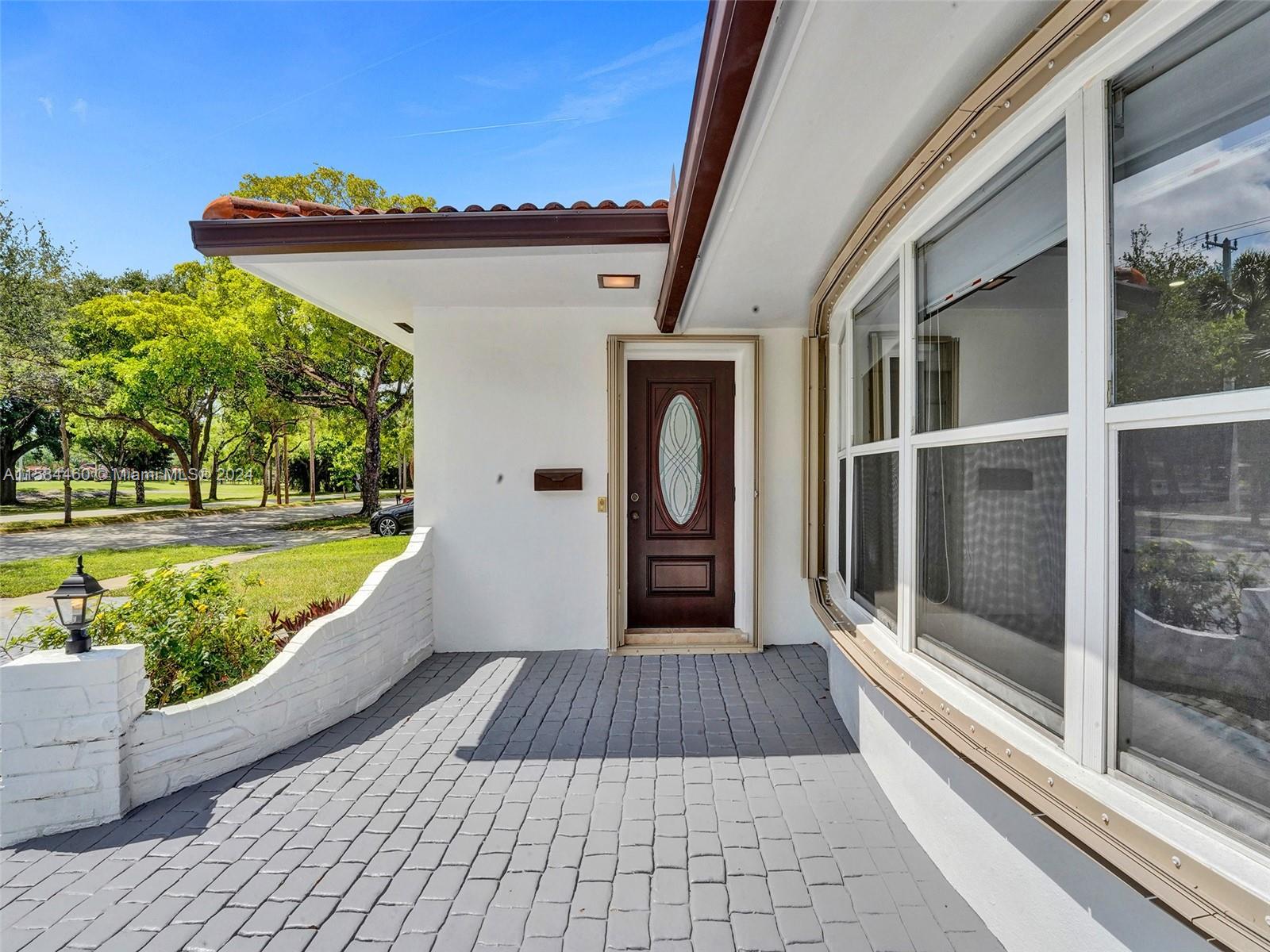 3460 North 46th Avenue Hollywood, FL 33021 - Photo 7 of 35 a view of a house with a porch
