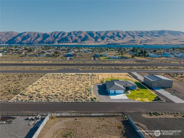 a view of swimming pool with a yard