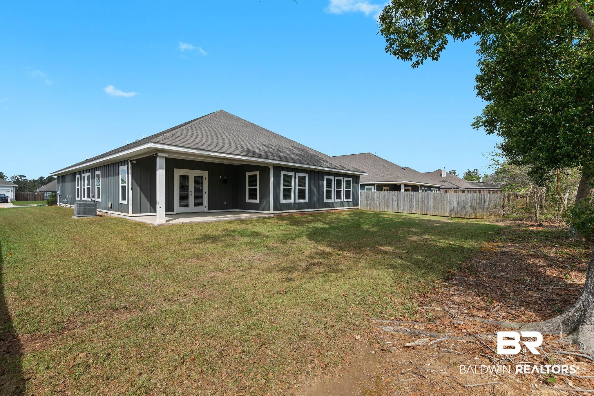 9448 Amethyst Drive Daphne, AL 36526 - Photo 54 of 61 Rear view of property with roof with shingles, french doors, and a patio area