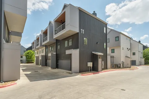 a view of a building with a street