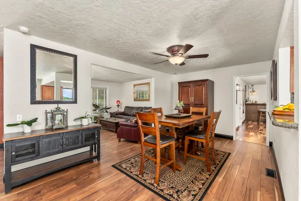 a view of a dining room with furniture