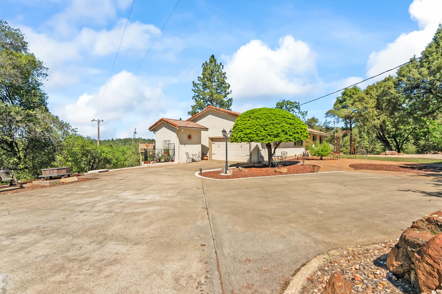 17065 Niles Road Jackson, CA 95642 - Photo 5 of 23 a view of a house with a yard and entertaining space
