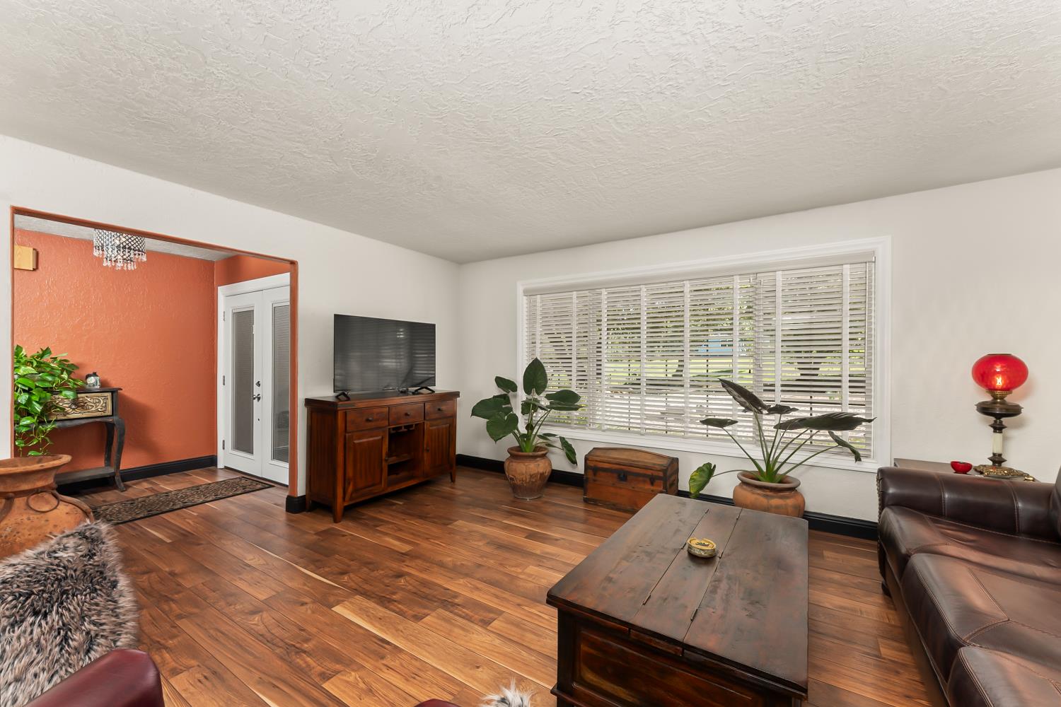 17065 Niles Road Jackson, CA 95642 - Photo 7 of 23 a living room with furniture and a flat screen tv