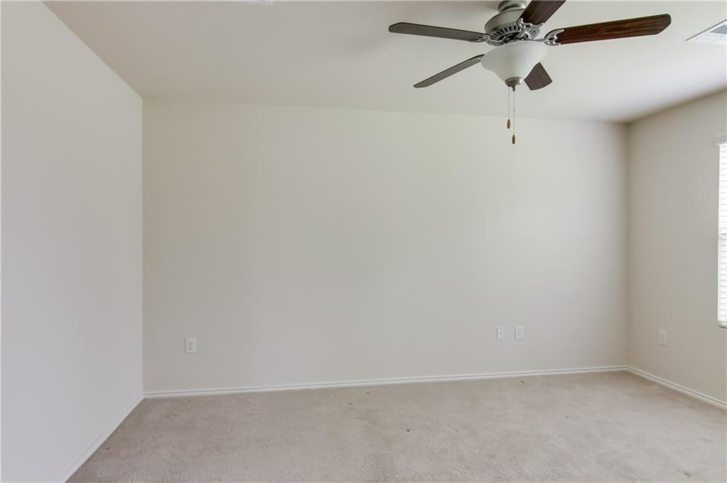 5916 Kennedy Street Austin, TX 78747 - Photo 13 of 25 Spare room featuring light carpet and ceiling fan