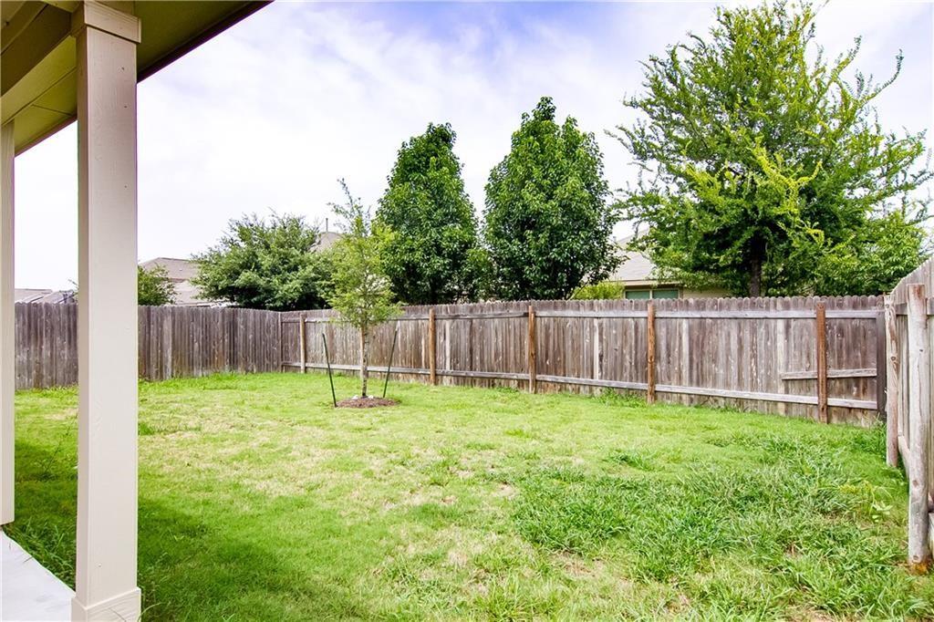 5916 Kennedy Street Austin, TX 78747 - Photo 18 of 25 Fenced backyard with a patio
