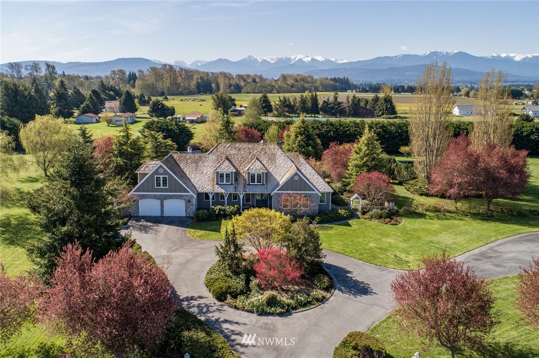 an aerial view of a house with a garden