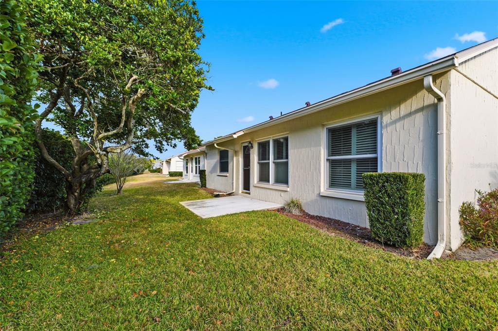 11541 Orleans Lane Port Richey, FL 34668 - Photo 26 of 53 a view of a house with backyard and sitting area