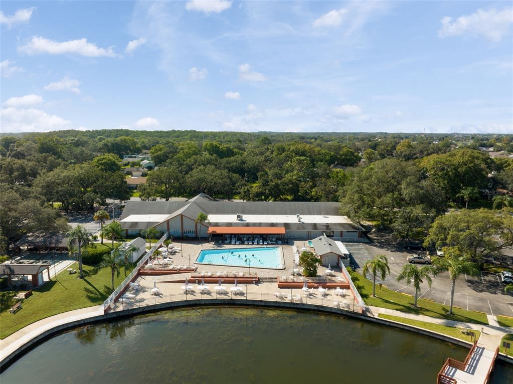 11541 Orleans Lane Port Richey, FL 34668 - Photo 49 of 53 a view of a swimming pool with a lake view