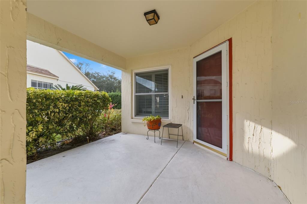 11541 Orleans Lane Port Richey, FL 34668 - Photo 7 of 53 a outdoor space with lots of potted plants