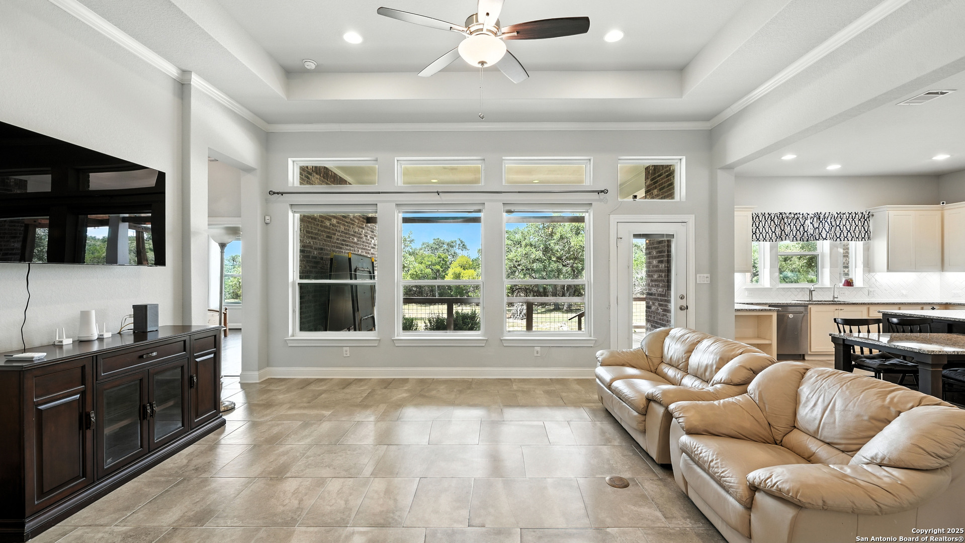 179 Prairie Dawn Spring Branch, TX 78070 - Photo 13 of 45 a living room with furniture and a large window
