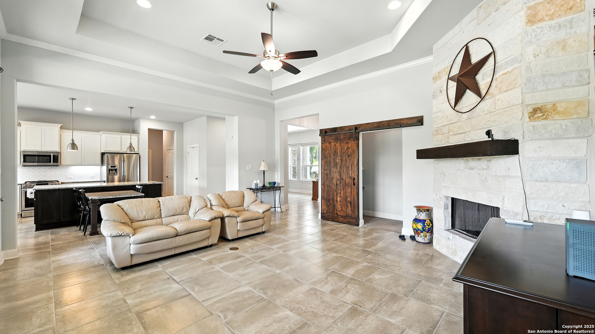 179 Prairie Dawn Spring Branch, TX 78070 - Photo 15 of 45 a living room with furniture and kitchen view
