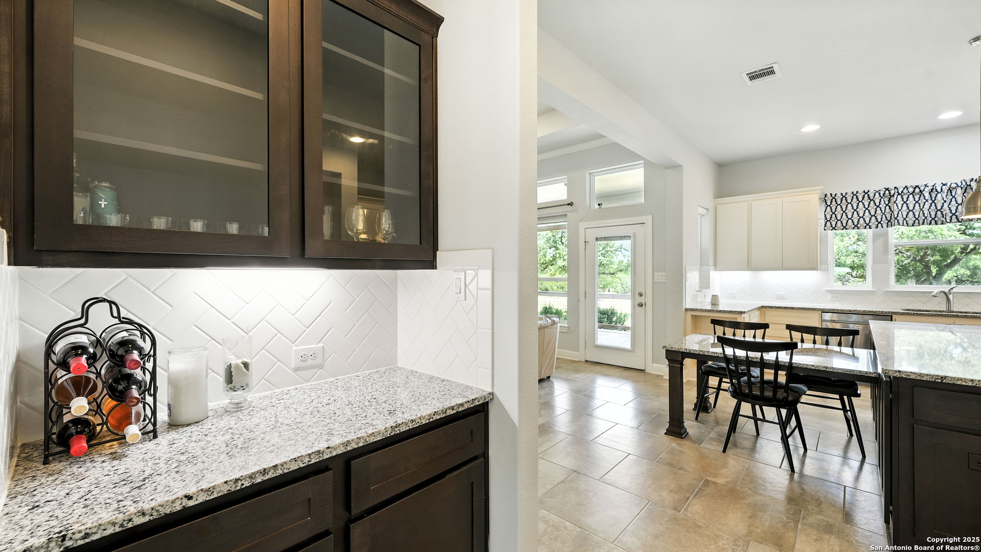 179 Prairie Dawn Spring Branch, TX 78070 - Photo 16 of 45 a view of a kitchen with granite countertop lots of counter space