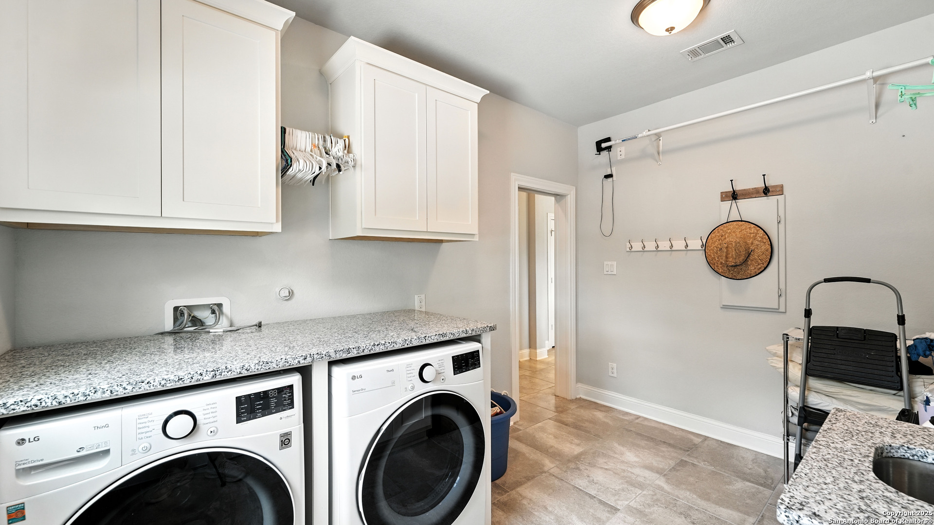 179 Prairie Dawn Spring Branch, TX 78070 - Photo 18 of 45 a view of livingroom with washer and dryer