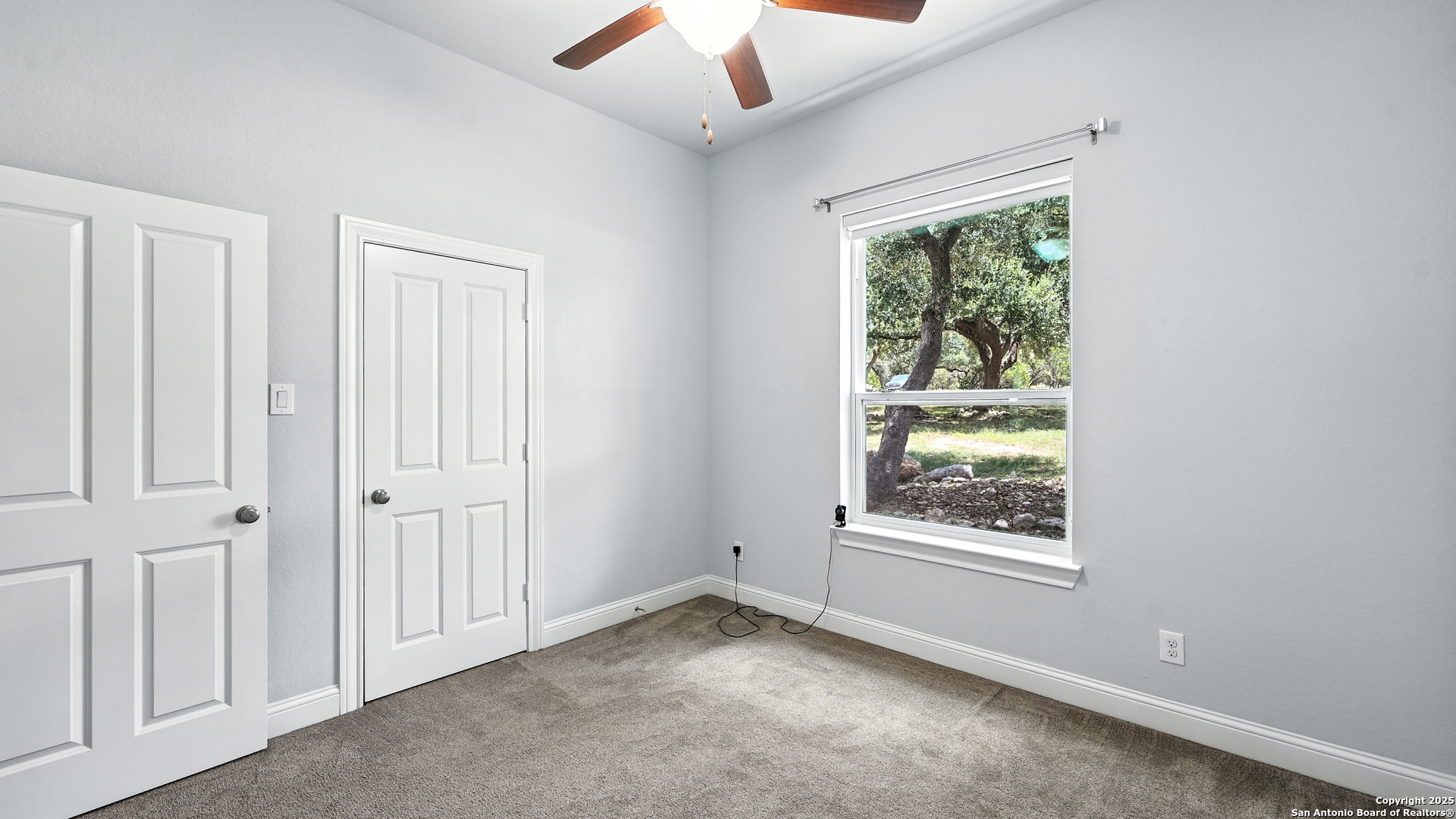 179 Prairie Dawn Spring Branch, TX 78070 - Photo 27 of 45 an empty room with a window
