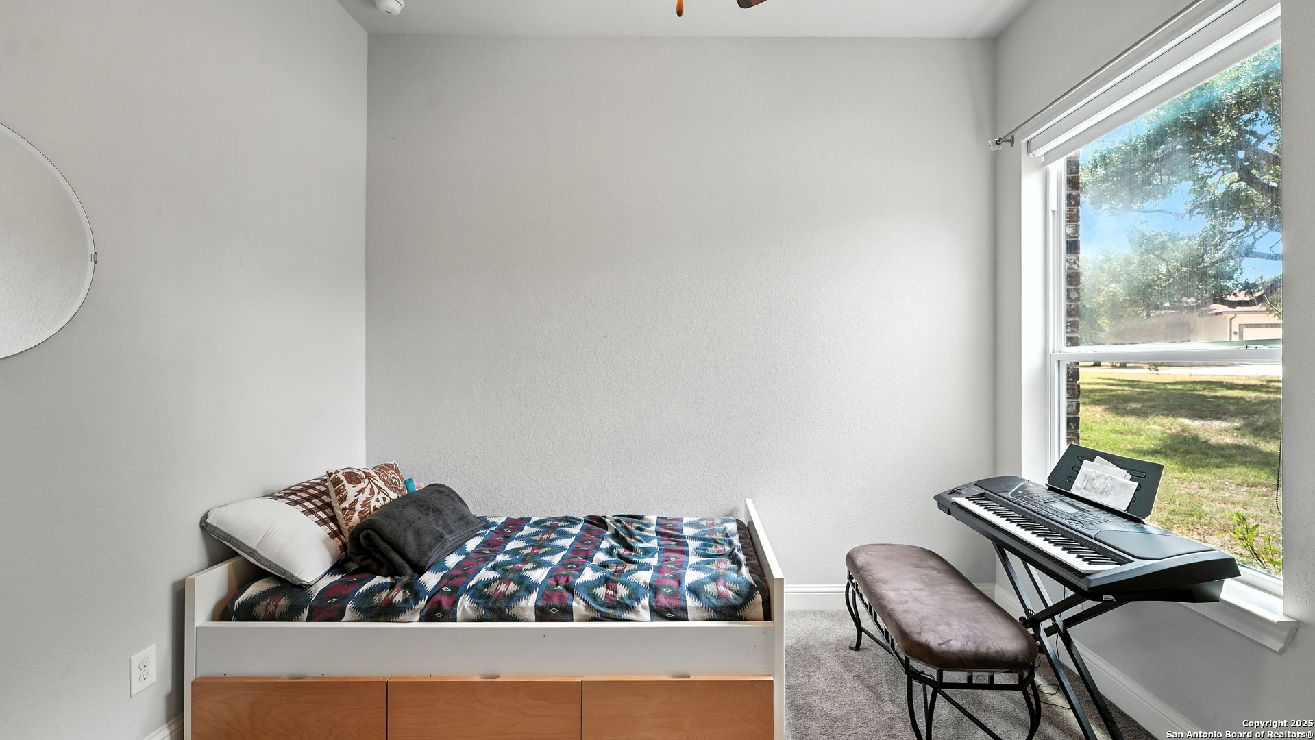 179 Prairie Dawn Spring Branch, TX 78070 - Photo 31 of 45 a bed room with furniture and a window