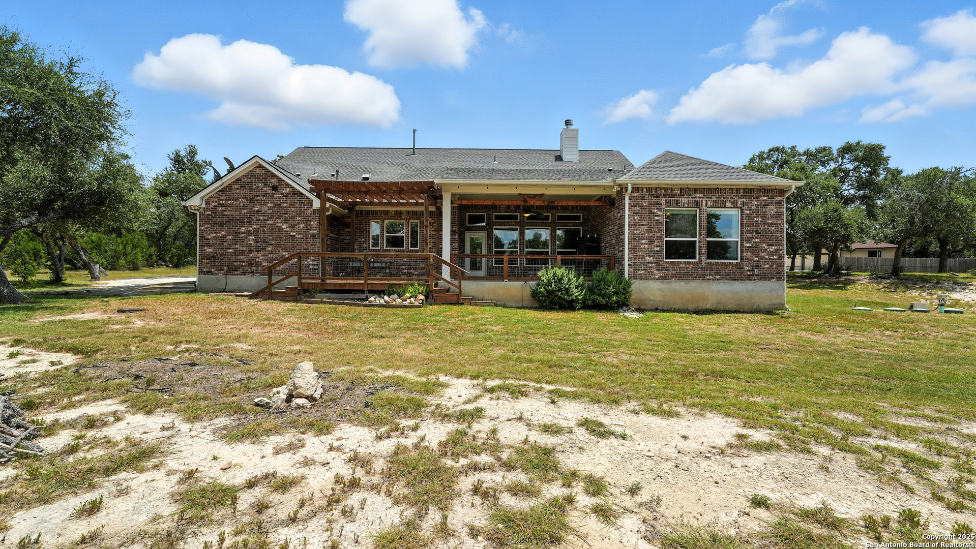 179 Prairie Dawn Spring Branch, TX 78070 - Photo 42 of 45 a view of a house with a yard