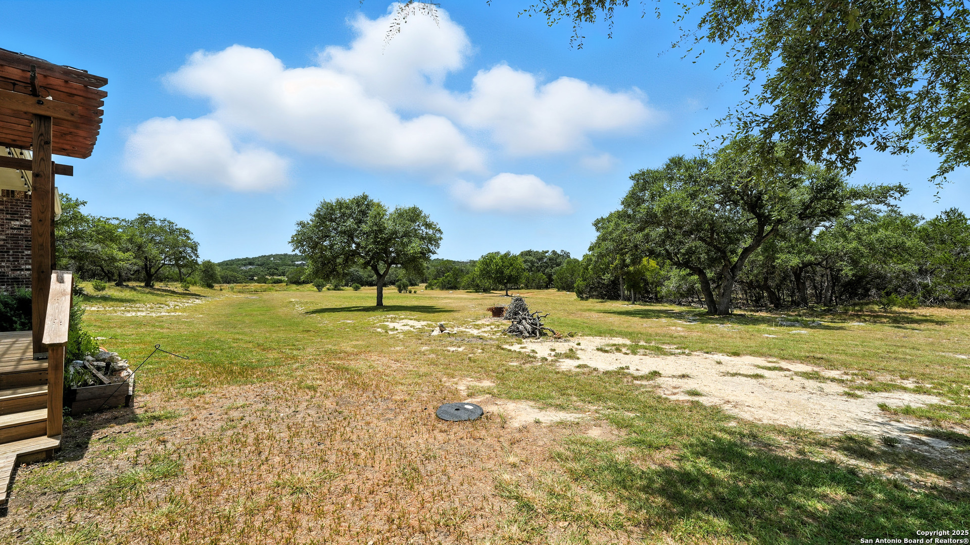 179 Prairie Dawn Spring Branch, TX 78070 - Photo 44 of 45 a view of a swimming pool with an outdoor space and seating area