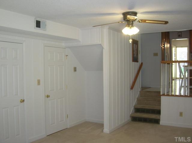 533 Maple Lane Raleigh, NC 27603 - Photo 13 of 25 a view of entryway with stairs