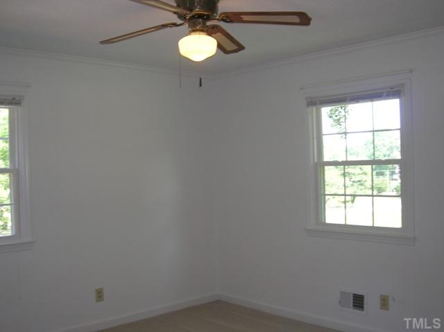 533 Maple Lane Raleigh, NC 27603 - Photo 16 of 25 an empty room with a window