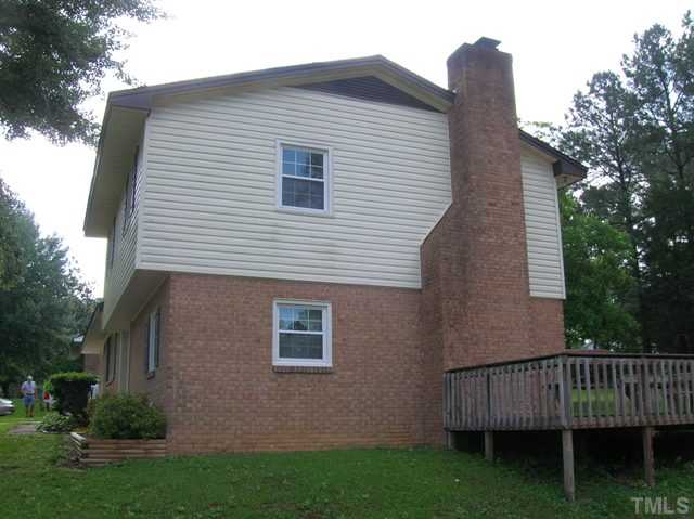 533 Maple Lane Raleigh, NC 27603 - Photo 3 of 25 a view of backyard with green space