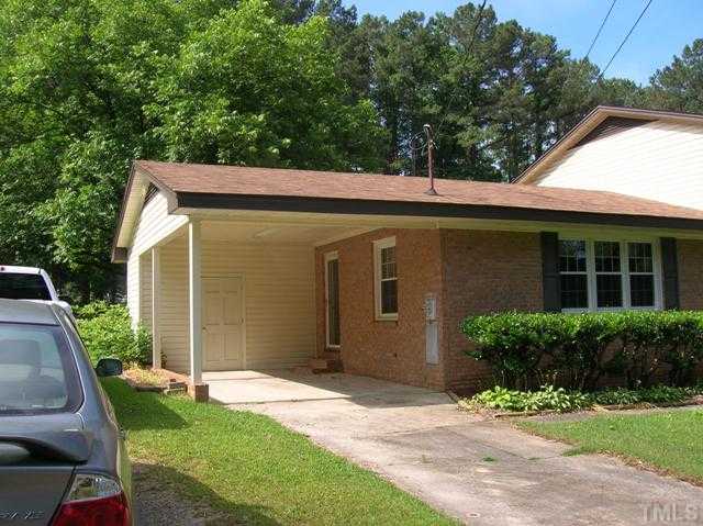 533 Maple Lane Raleigh, NC 27603 - Photo 5 of 25 a front view of a house with a yard