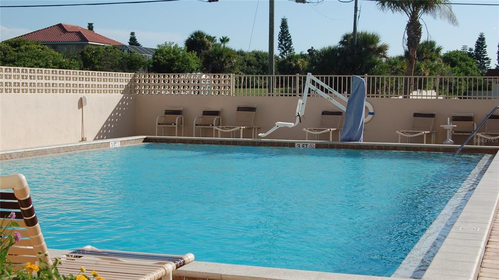 4453 South Atlantic Avenue, Unit 604 Ponce Inlet, FL 32127 - Photo 24 of 28 a view of a house with a wooden deck