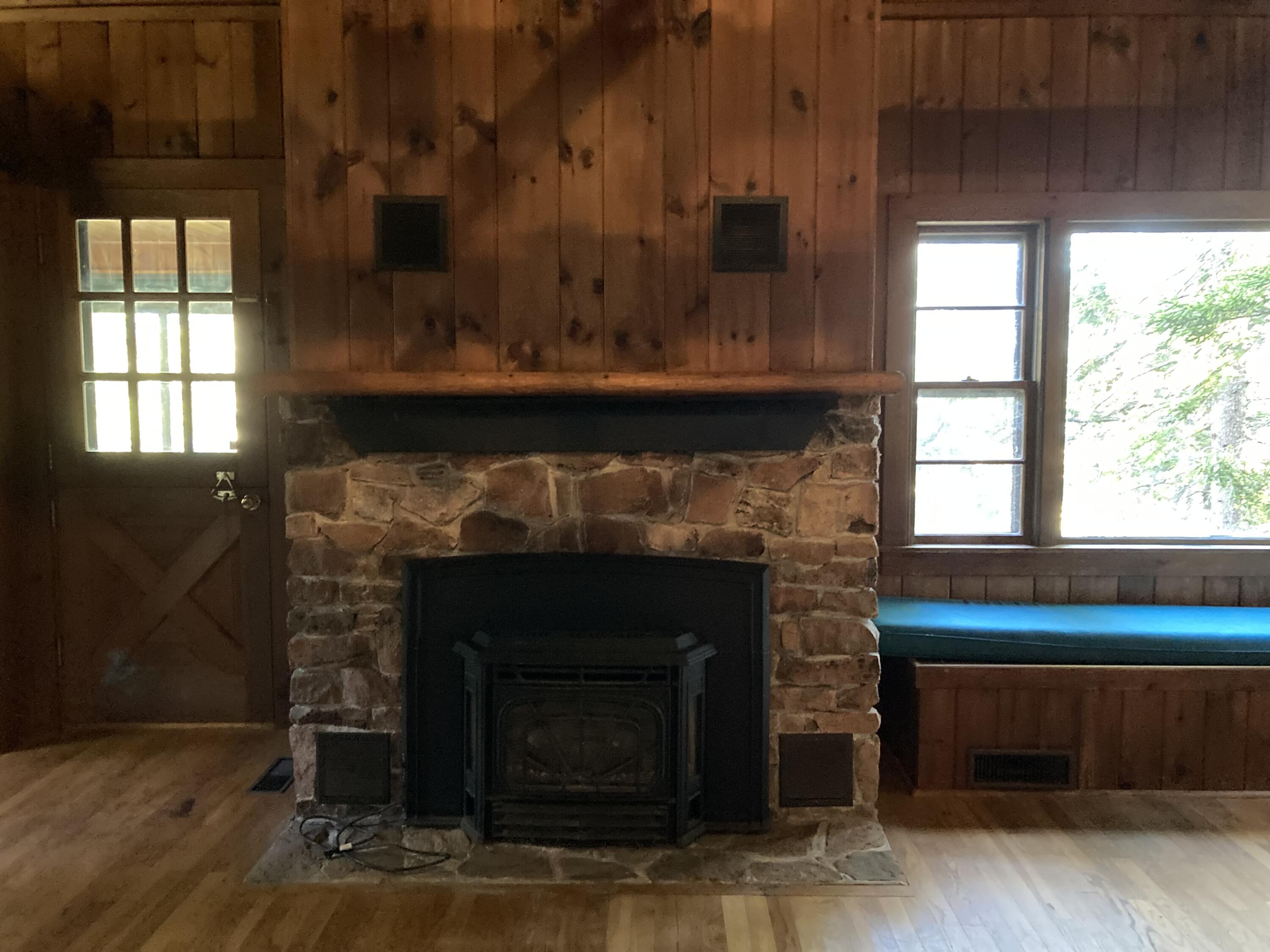 145 Summer Harbor Road Gouldsboro, ME 04607 - Photo 17 of 36 Pink granite fireplace w/insert.