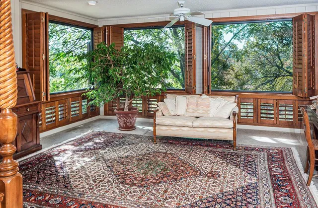 a living room with large window