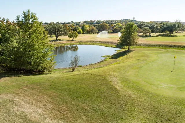 a view of a lake with a mountain