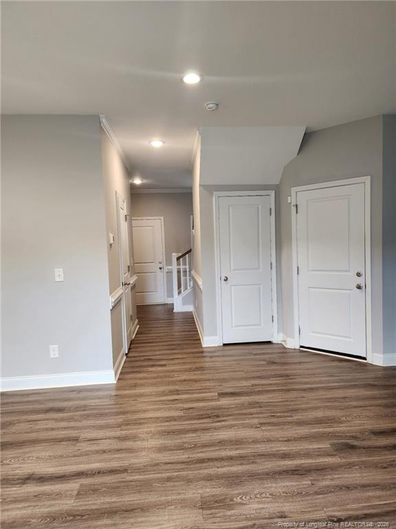 7810 Rufus Johnson Road St. Pauls, NC 28384 - Photo 12 of 27 a view of a hallway with wooden floor