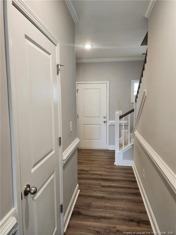 7810 Rufus Johnson Road St. Pauls, NC 28384 - Photo 27 of 27 a view of a hallway with wooden floor and staircase