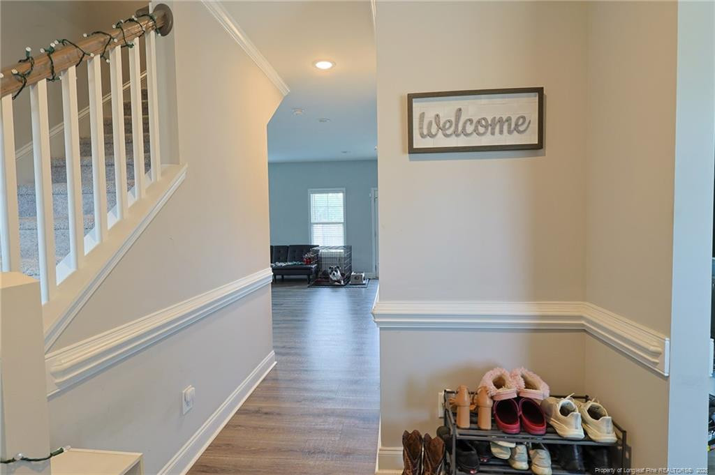 7810 Rufus Johnson Road St. Pauls, NC 28384 - Photo 8 of 24 a view of a hallway with wooden floor and closet