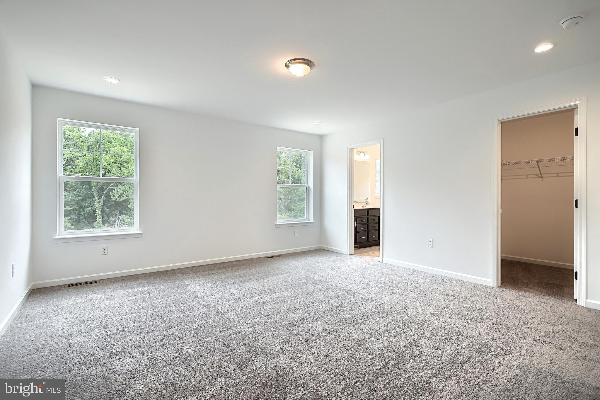 Emily Plan At Hickory Pointe Waynesboro, PA 17268 - Photo 14 of 22 an empty room with windows and closet