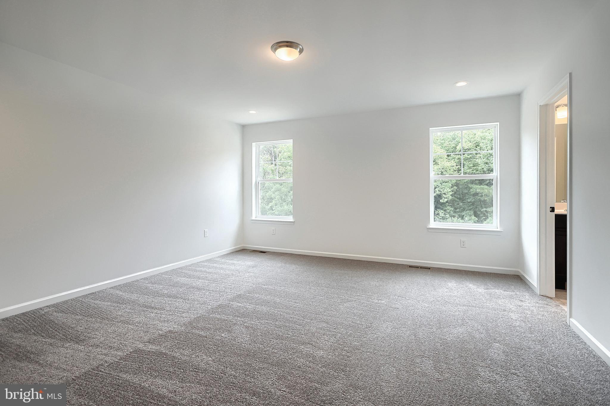 Emily Plan At Hickory Pointe Waynesboro, PA 17268 - Photo 15 of 22 an empty room with windows