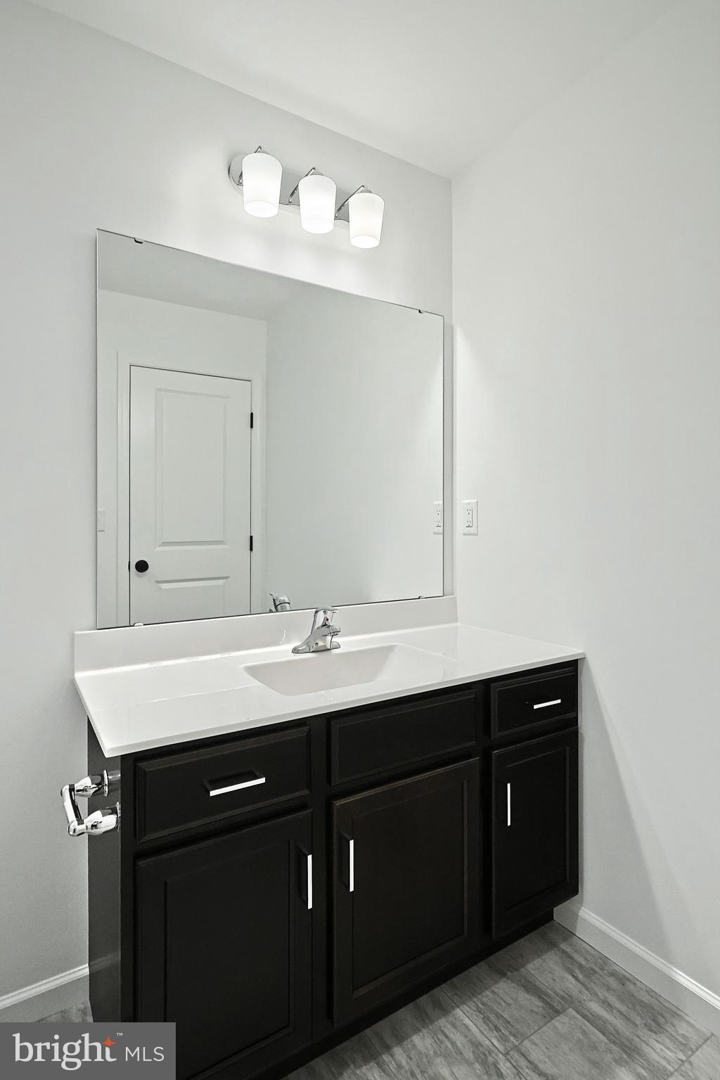 Emily Plan At Hickory Pointe Waynesboro, PA 17268 - Photo 22 of 22 a bathroom with a sink and a mirror