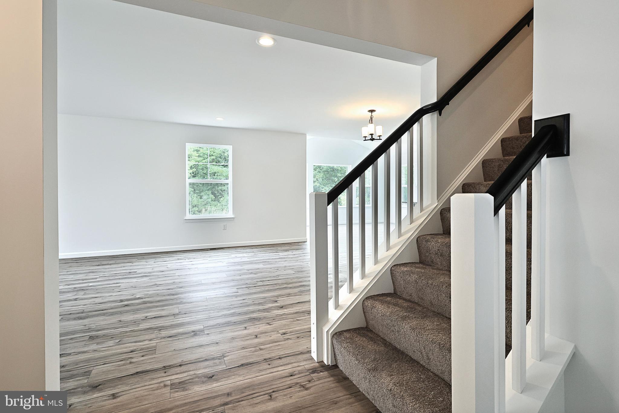 Emily Plan At Hickory Pointe Waynesboro, PA 17268 - Photo 5 of 22 a view of entryway and hall with wooden floor