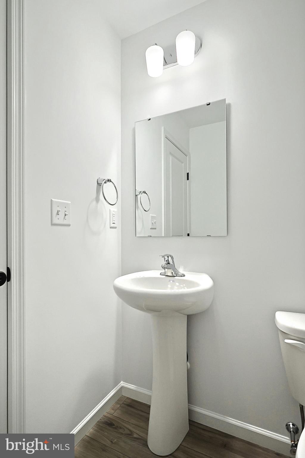 Emily Plan At Hickory Pointe Waynesboro, PA 17268 - Photo 6 of 22 a bathroom with a sink toilet and mirror