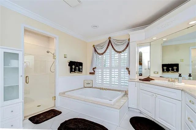 a bathroom with a sink a vanity and a mirror