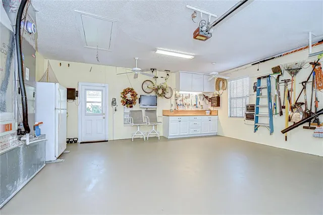 a view of a kitchen with furniture and a kitchen