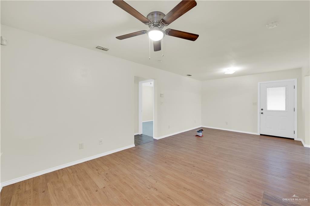 4200 Linda Vista Street Pharr, TX 78577 - Photo 13 of 17 wooden floor in an empty room