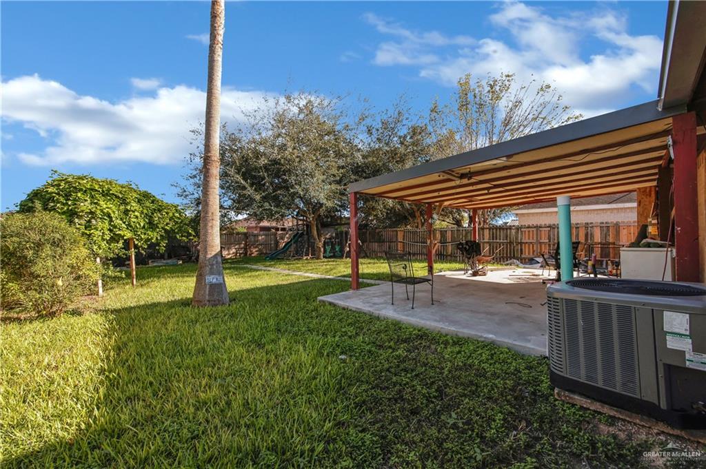 4200 Linda Vista Street Pharr, TX 78577 - Photo 16 of 17 a view of a patio with a table and chairs