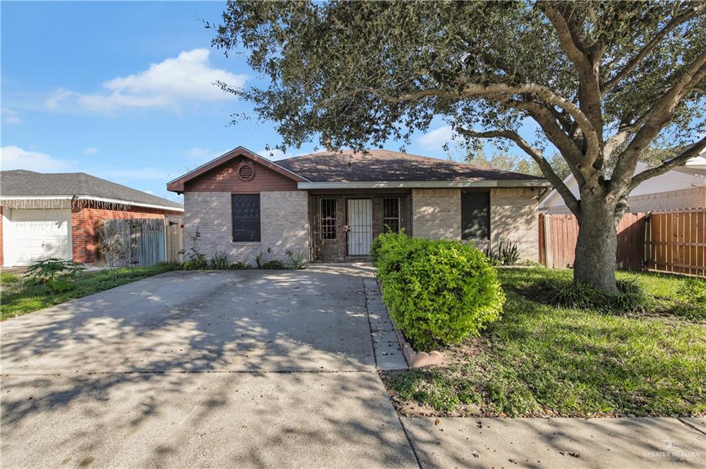 4200 Linda Vista Street Pharr, TX 78577 - Photo 2 of 17 a front view of a house with garden