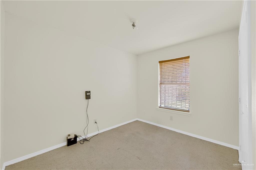 4200 Linda Vista Street Pharr, TX 78577 - Photo 10 of 17 a view of an empty room with a window