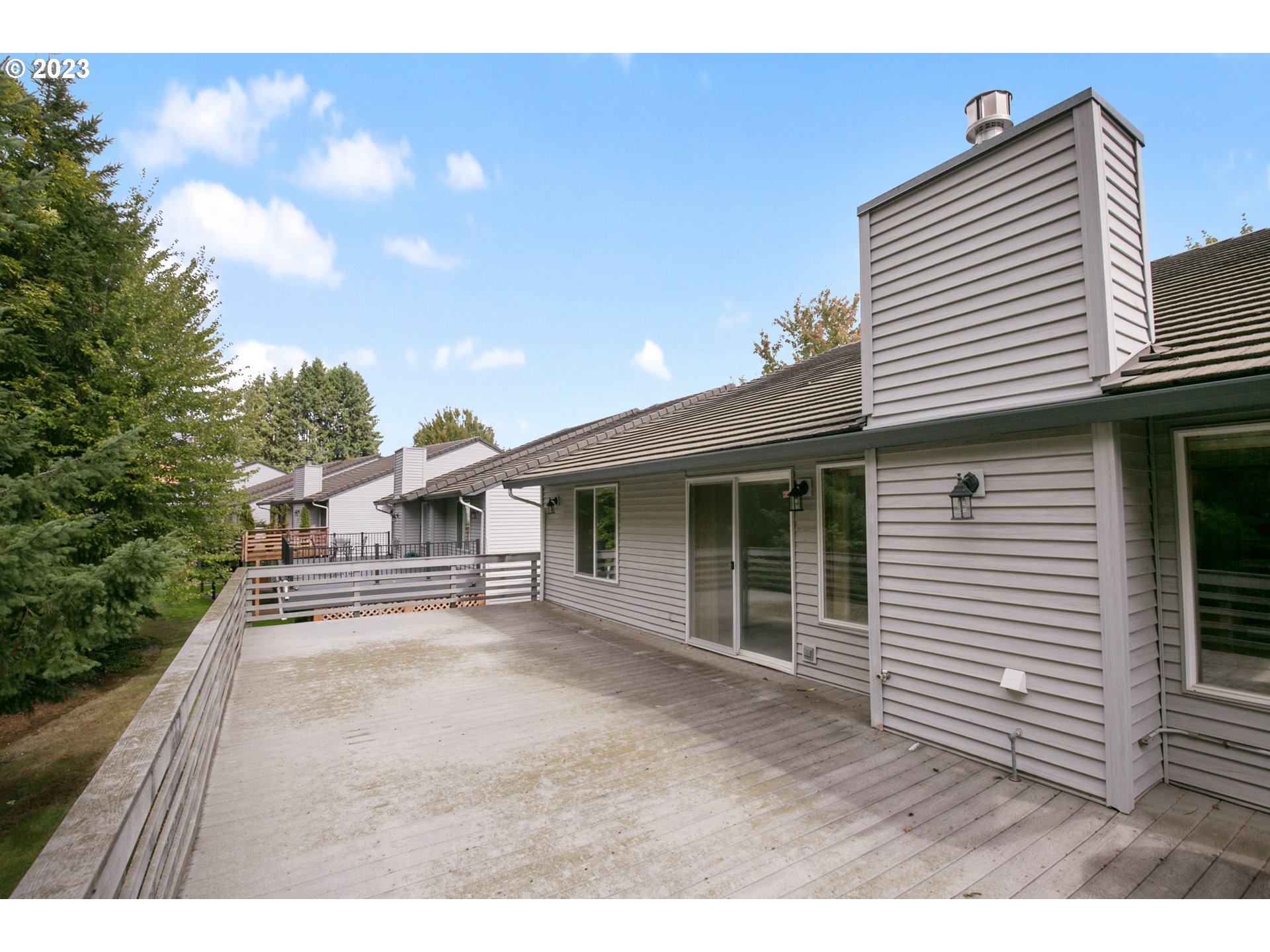 2217 Northeast 179th Street, Unit E10 Ridgefield, WA 98642 - Photo 14 of 23 a view of a house with a patio