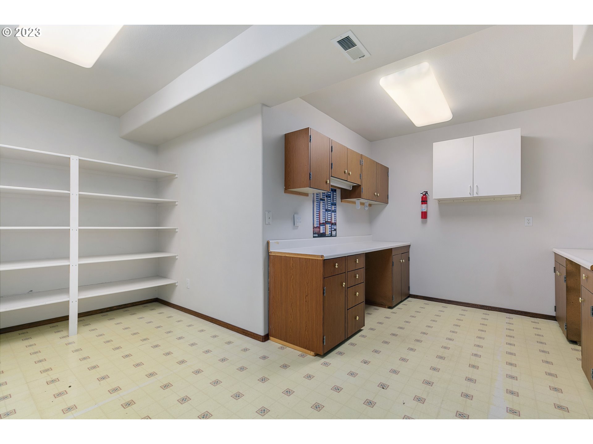 2217 Northeast 179th Street, Unit E10 Ridgefield, WA 98642 - Photo 18 of 23 a kitchen with a cabinets and counter space