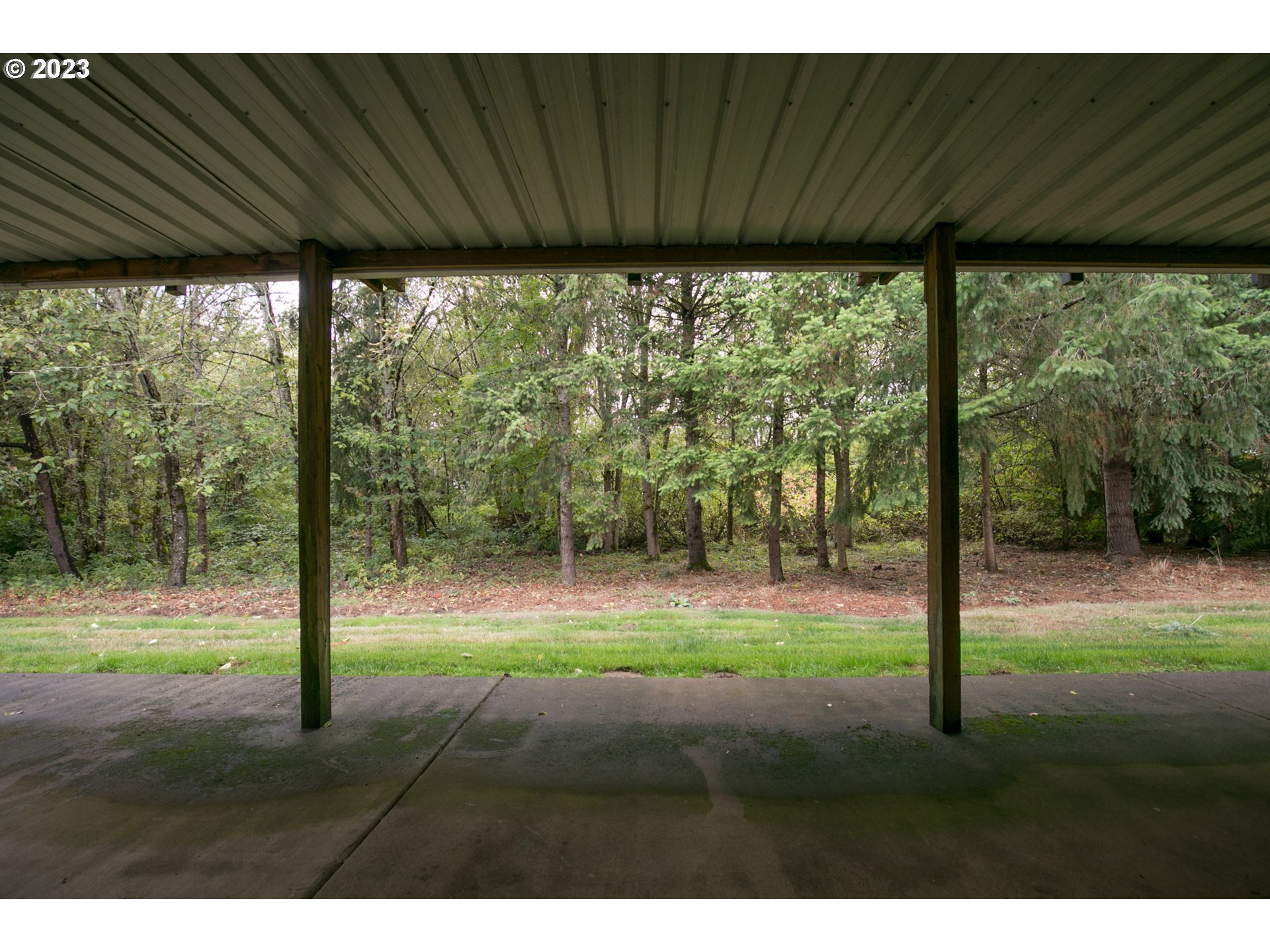 2217 Northeast 179th Street, Unit E10 Ridgefield, WA 98642 - Photo 21 of 23 a backyard of a house with lots of green space
